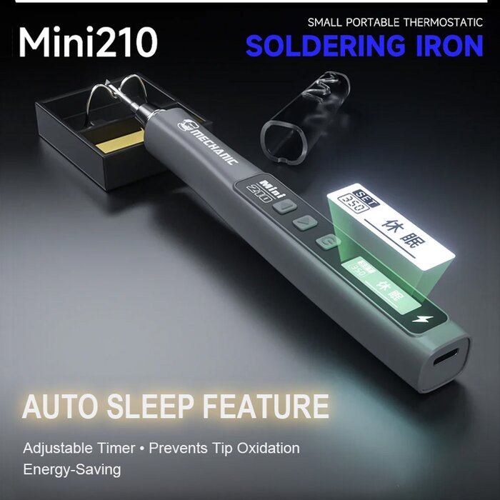 Mỏ hàn MECHANIC Mini210 ở chế độ ngủ đặt cạnh giá đỡ có bọt biển, màn hình hiện chữ ngủ và cổng Type-C ở đuôi