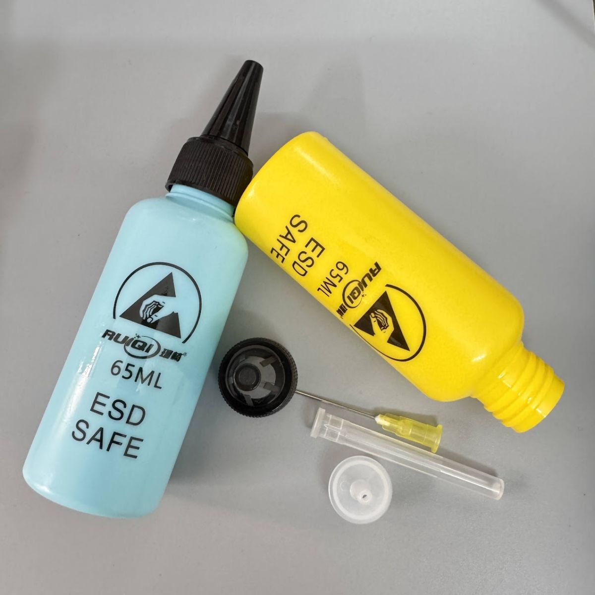 Lọ đựng dung dịch RUIQI ESD 65ml, sản phẩm chống tĩnh điện cho thợ sửa chữa điện thoại